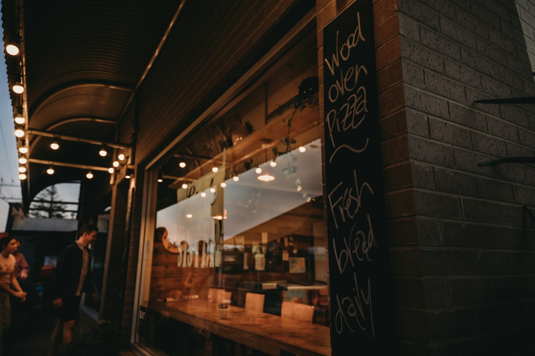 A storefront glowing at night