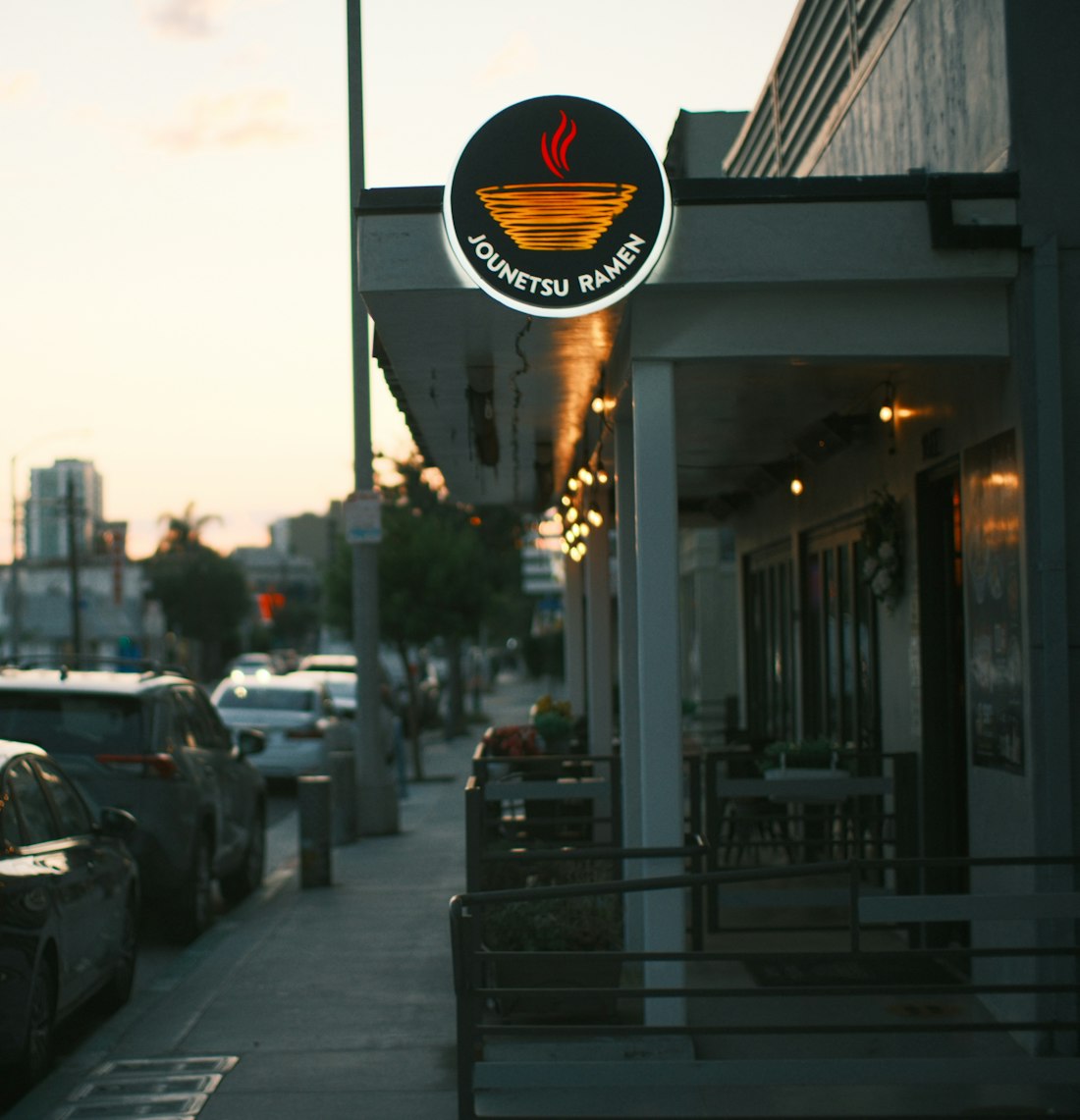 A café storefront at dusk